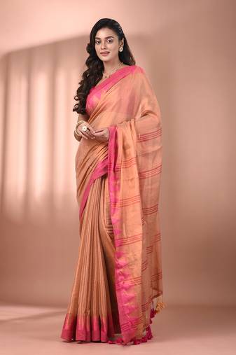 Beige tissue soft saree with temple borders