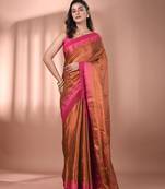 Brown tissue soft saree with temple borders