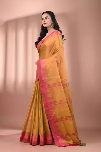 Lemon yellow tissue soft saree with temple borders