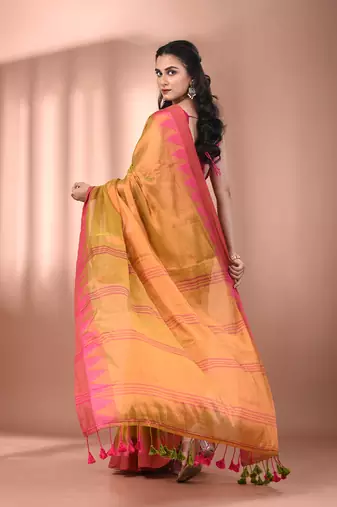 Lemon yellow tissue soft saree with temple borders