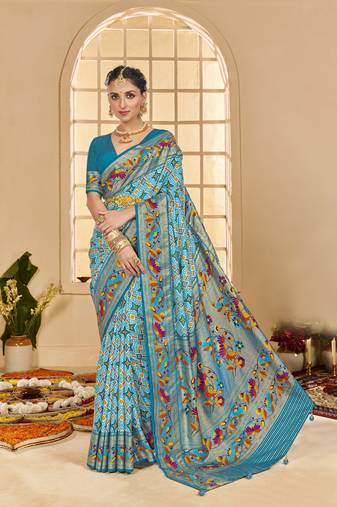 Turqoise blue woven border with ikkat printed cotton silk blend saree