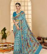 Turqoise blue woven border with ikkat printed cotton silk blend saree