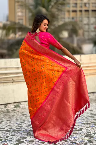 Orange patola silk blend weaving ikkat meenakari saree