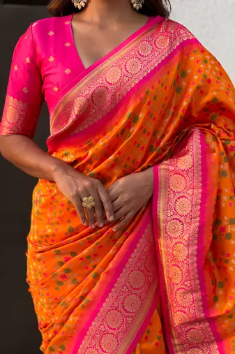 Orange patola silk blend weaving ikkat meenakari saree