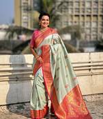 Sea green soft silk blend woven meenakari saree