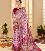 Baby pink woven border with ikkat printed cotton silk blend saree