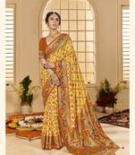 Orange & yellow woven border with ikkat printed cotton silk blend saree