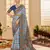 Light blue woven border with ikkat printed cotton silk blend saree