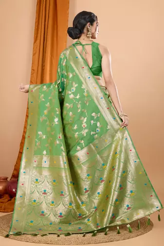 Green faux banarasi silk blend saree with woven zari work