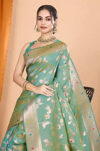 Pista faux banarasi silk blend saree with woven zari work