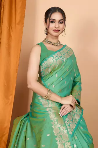 Green woven zari faux banarasi silk blend saree