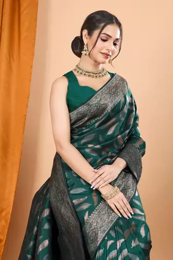 Woven double zari green soft silk blend partywear saree