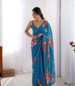 Blue georgette saree with hand print and moti lace border