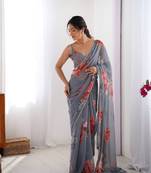 Grey georgette saree with hand print and moti lace border