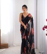 Black georgette saree with hand print and moti lace border