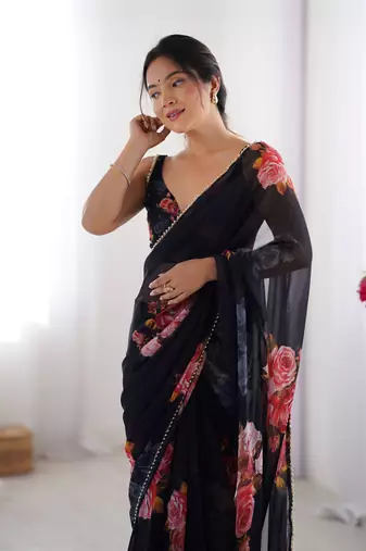 Black georgette saree with hand print and moti lace border