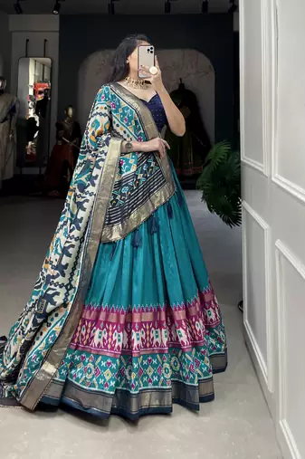Firozi tussar silk with patola print foil work lehenga choli for women