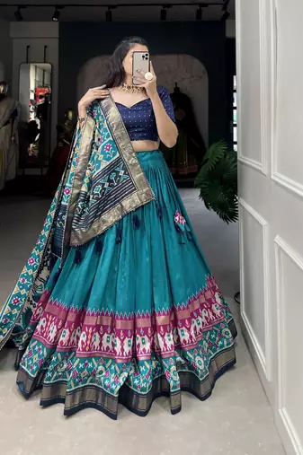 Firozi tussar silk with patola print foil work lehenga choli for women