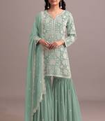 Green embroidered faux georgette semi stitched sharara suit