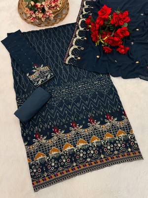 Blue embroidered faux georgette sharara suit 3