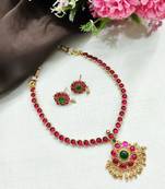 Gold plated ruby green kemp studded flower necklace set