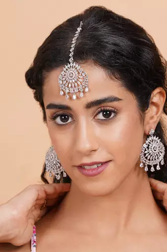 Aurora luxe silver-plated cz-ad earrings-maangtikka set for weddings