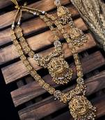 Ethnic gold plated double laxmi patti jewellery set with golden droplet beads