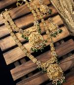 Ethnic gold plated double laxmi patti jewellery set with green droplet beads