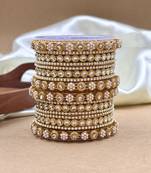 Golden studded pearl bangle set