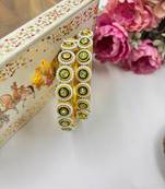 Gold chuda set with white stone work