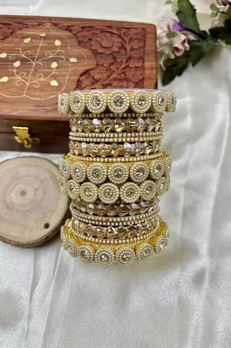 Golden timeless pearl adorn bangle set