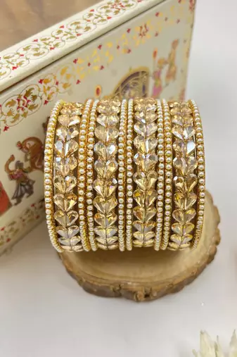 Gold pearl studded bangle set for women