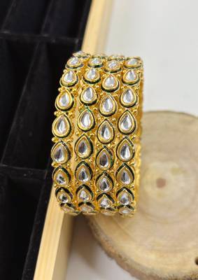 Gold designer bangle set with green touch for women 2