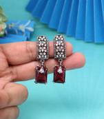 Deep maroon color fashion earrings