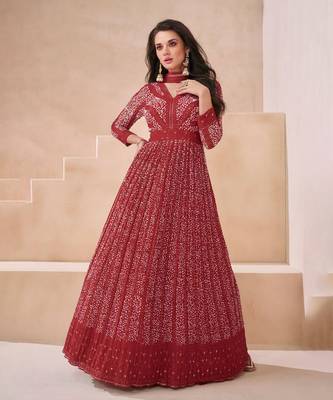 Red embroidery sequins work georgette gown- free size stitched(size upto 42") 1