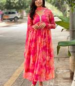 Beautiful pink ceremonial dress with designer printed work on georgette fabric