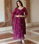 Beautiful wine ceremonial dress with embroidered work work on viscosee silk fabric