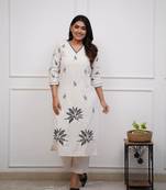 Beautiful white ceremonial dress with embroidered work work on viscosee fabric