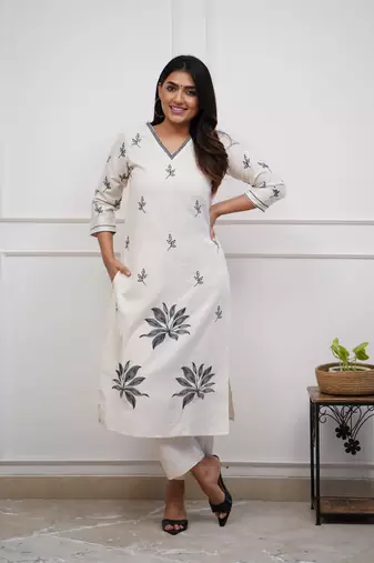 Beautiful white ceremonial dress with embroidered on viscosee 