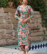 Beautiful green ceremonial dress with printed work on viscosee fabric