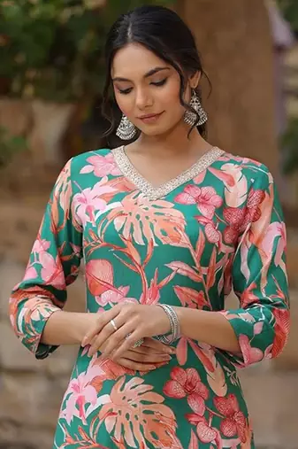 Beautiful green ceremonial dress with printed on viscosee 