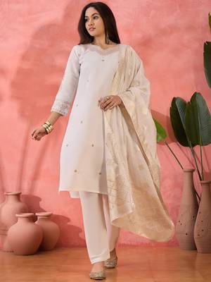 Off white roman silk suit designed with embroidery and wevon  1
