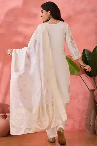 Off white roman silk suit designed with embroidery and wevon 