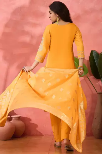 Yellow roman silk suit designed with embroidery and wevon 