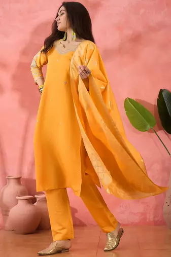 Yellow roman silk suit designed with embroidery and wevon 