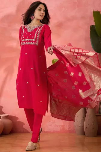 Pink roman silk suit designed with embroidery and wevon 