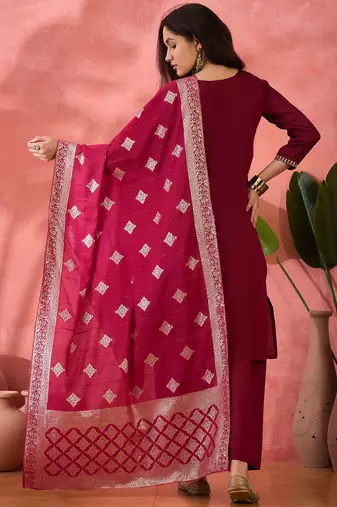 Maroon roman silk suit designed with embroidery and wevon 