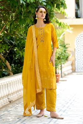 Yellow viscosee rayon readymade suit with plesent embroidery  1