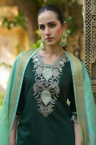 Green viscosee rayon readymade suit with plesent embroidery 