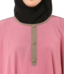 Pink kaftan with fashionable buttons
